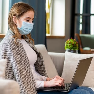 Woman working from home during COVID-19 pandemic
