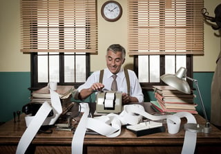bigstock-Busy-Vintage-Accountant-With-C-85001567.jpg