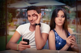 bigstock-Secretive-Couple-with-Smart-Ph-71916307.jpg