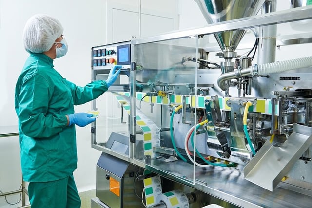 Woman working in a pharmaceutical factory