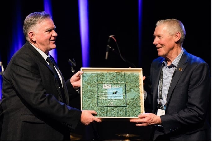 Project X creator, David Robinson (left) accepting MAV Tech award.